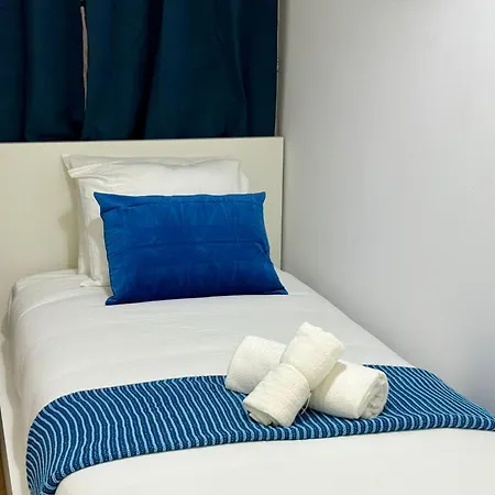 Quarto em Acomodações Particulares Travelers House *